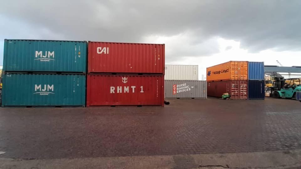 Containers stored in an open logistics yard
